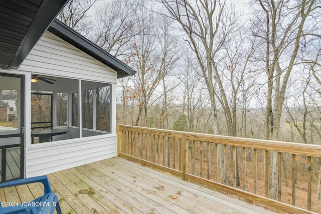 deck with a sunroom