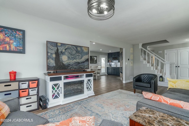 living room featuring dark hardwood / wood-style flooring