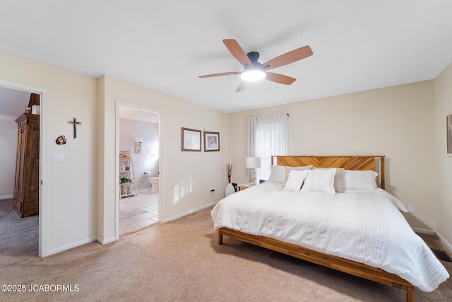 1548 Skyview, Holts Summit, MO 65043 - bedroom with light carpet, baseboards, a ceiling fan, and connected bathroom