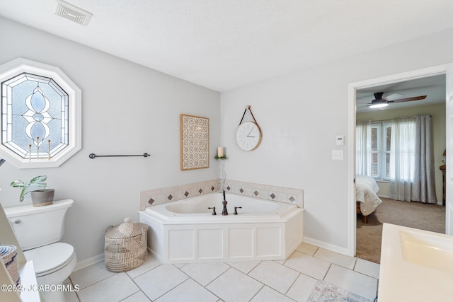 1548 Skyview, Holts Summit, MO 65043 - ensuite bathroom with a bath, tile patterned flooring, toilet, and baseboards