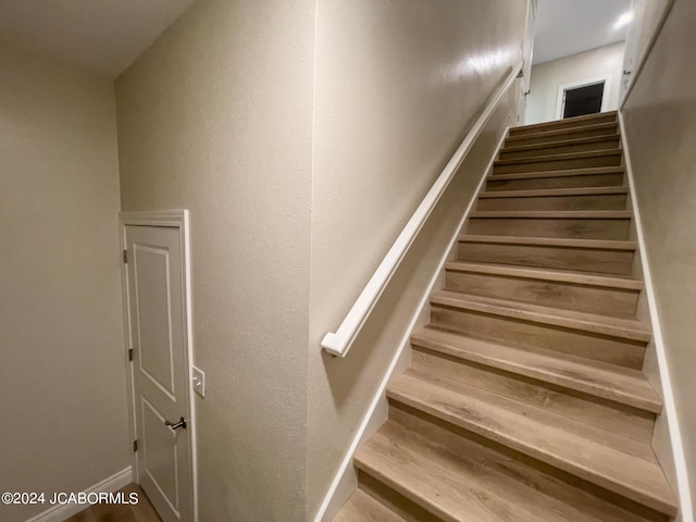 stairs with a textured wall