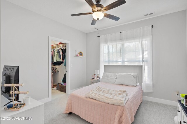 15005 Wrangle Ln, Ashland, MO 65010 - bedroom with visible vents, light carpet, a closet, and a walk in closet