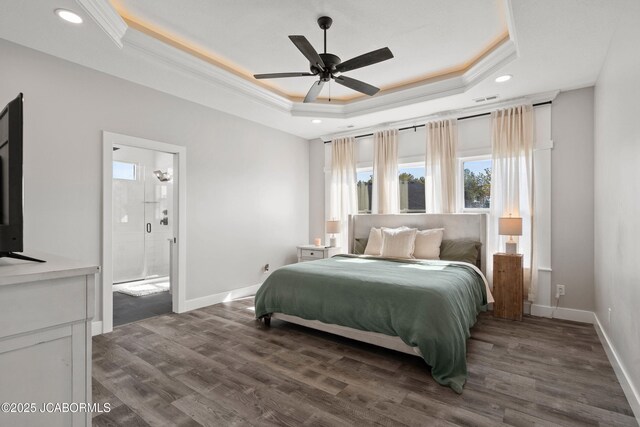 15005 Wrangle Ln, Ashland, MO 65010 - bedroom featuring a tray ceiling, dark wood-style floors, and baseboards