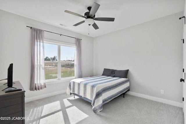 15005 Wrangle Ln, Ashland, MO 65010 - carpeted bedroom featuring baseboards, visible vents, and ceiling fan