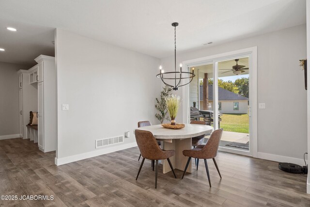 15005 Wrangle Ln, Ashland, MO 65010 - dining area with visible vents, baseboards, recessed lighting, an inviting chandelier, and wood finished floors