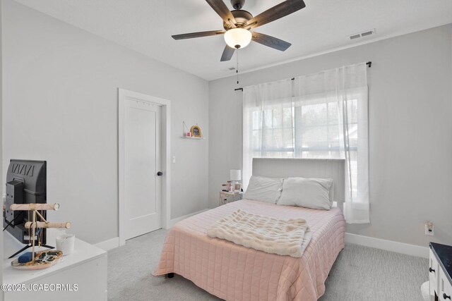 15005 Wrangle Ln, Ashland, MO 65010 - bedroom featuring visible vents, light carpet, baseboards, and a ceiling fan