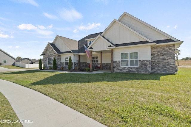 15005 Wrangle Ln, Ashland, MO 65010 - craftsman inspired home featuring a front lawn, fence, board and batten siding, and stone siding
