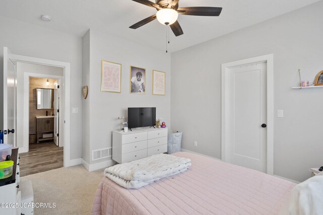 15005 Wrangle Ln, Ashland, MO 65010 - bedroom with ceiling fan, baseboards, visible vents, and light carpet