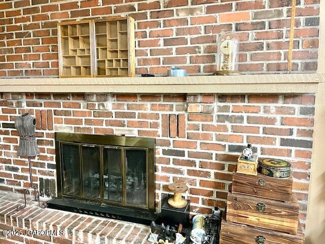 details with a brick fireplace