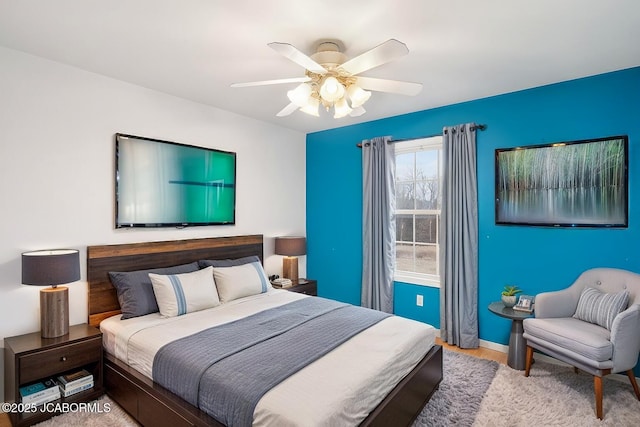 31500 Skyline Dr, California, MO 65018 - bedroom featuring a ceiling fan and wood finished floors