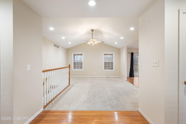 31500 Skyline Dr, California, MO 65018 - spare room with ceiling fan, recessed lighting, vaulted ceiling, and wood finished floors