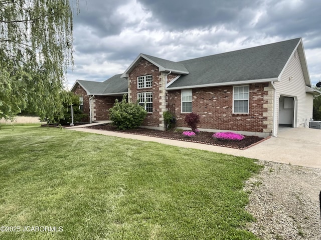 31500 Skyline Dr, California, MO 65018 - view of front of home featuring brick siding, driveway, roof with shingles, and a front lawn