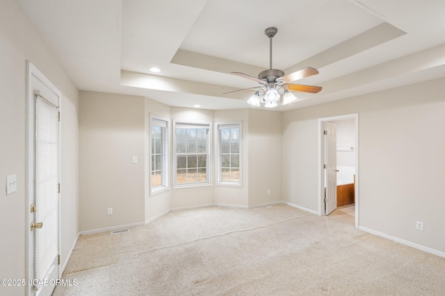 31500 Skyline Dr, California, MO 65018 - carpeted spare room with a tray ceiling, ceiling fan, and recessed lighting