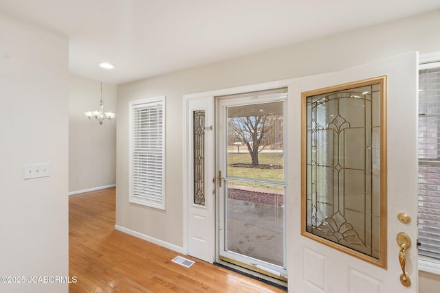 31500 Skyline Dr, California, MO 65018 - entryway featuring a chandelier, light wood-style floors, and recessed lighting