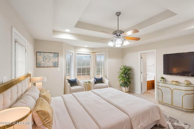 31500 Skyline Dr, California, MO 65018 - bedroom with a raised ceiling, recessed lighting, ensuite bathroom, a ceiling fan, and light colored carpet