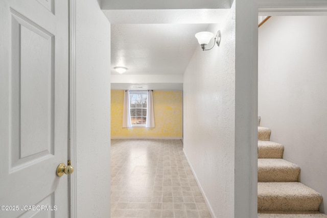 31500 Skyline Dr, California, MO 65018 - corridor featuring baseboards and stairs