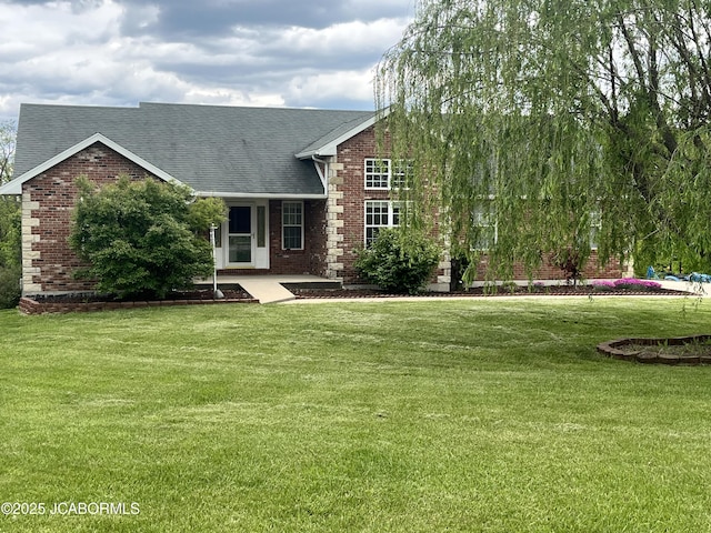 31500 Skyline Dr, California, MO 65018 - back of property with brick siding, a yard, and roof with shingles