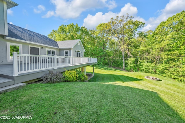 1503 State Highway Z, Centertown, MO 65023 - view of grassy yard with a wooden deck and an outdoor fire pit
