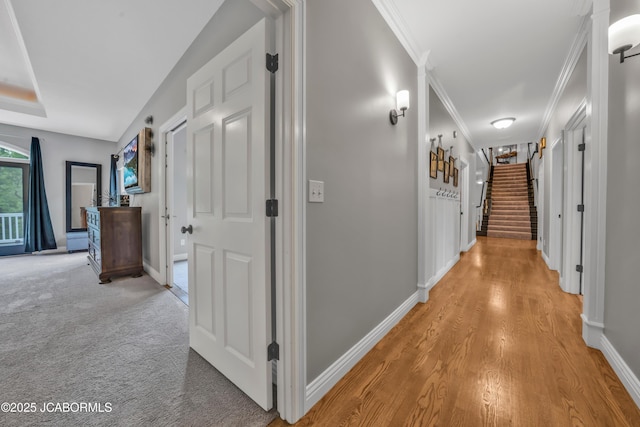 1503 State Highway Z, Centertown, MO 65023 - hallway featuring baseboards, stairs, light wood finished floors, and ornamental molding