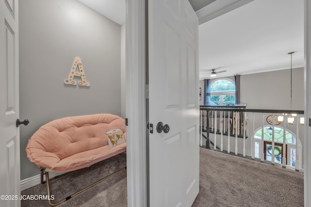 1503 State Highway Z, Centertown, MO 65023 - corridor featuring carpet flooring, an upstairs landing, a chandelier, and ornamental molding