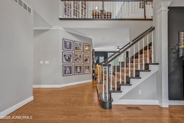 1503 State Highway Z, Centertown, MO 65023 - entryway with wood finished floors, stairs, baseboards, and a towering ceiling