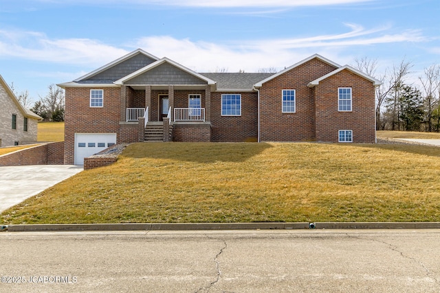 view of front of property featuring driveway, covered porch, a front lawn, and brick siding