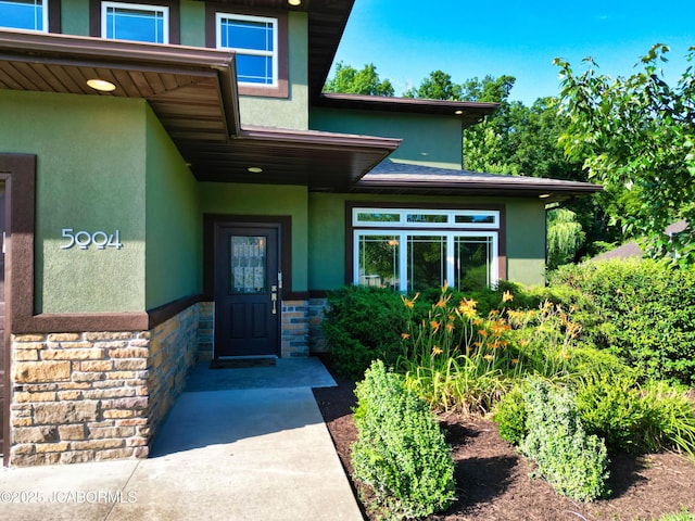 5004 Bates Creek Ct, Columbia, MO 65201 - entrance to property with stone siding and stucco siding