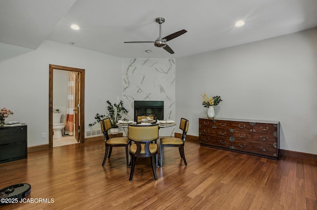 5004 Bates Creek Ct, Columbia, MO 65201 - dining space with a ceiling fan, wood finished floors, recessed lighting, and a premium fireplace