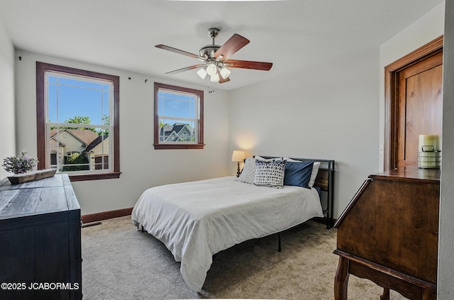 5004 Bates Creek Ct, Columbia, MO 65201 - bedroom with carpet floors and ceiling fan