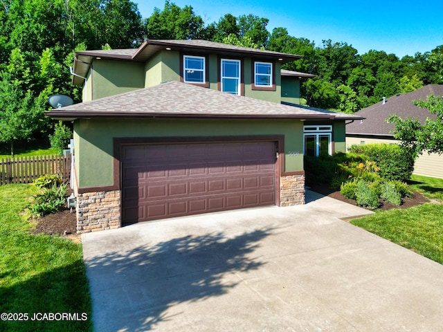 5004 Bates Creek Ct, Columbia, MO 65201 - prairie-style house featuring stone siding, stucco siding, and concrete driveway
