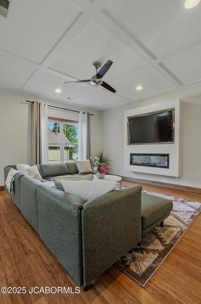 5004 Bates Creek Ct, Columbia, MO 65201 - living area featuring coffered ceiling, recessed lighting, a ceiling fan, wood finished floors, and beam ceiling