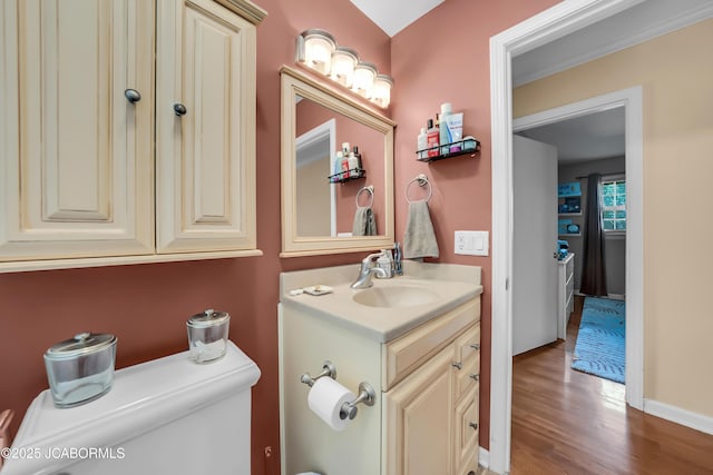 2213 Tanner Bridge Rd, Jefferson City, MO 65101 - half bath with vanity and wood finished floors