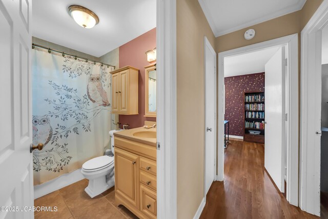2213 Tanner Bridge Rd, Jefferson City, MO 65101 - bathroom featuring vanity, wood finished floors, and wallpapered walls