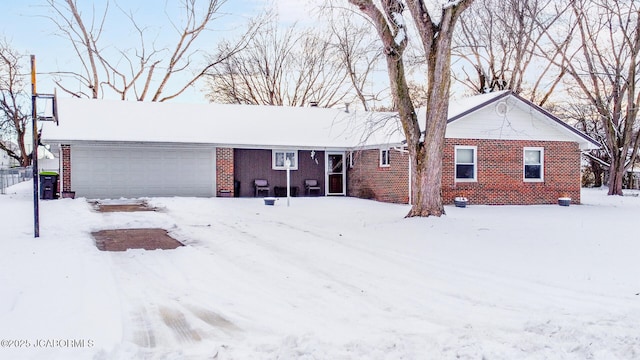 single story home featuring a garage