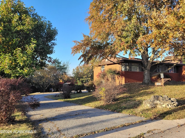 exterior space with a yard