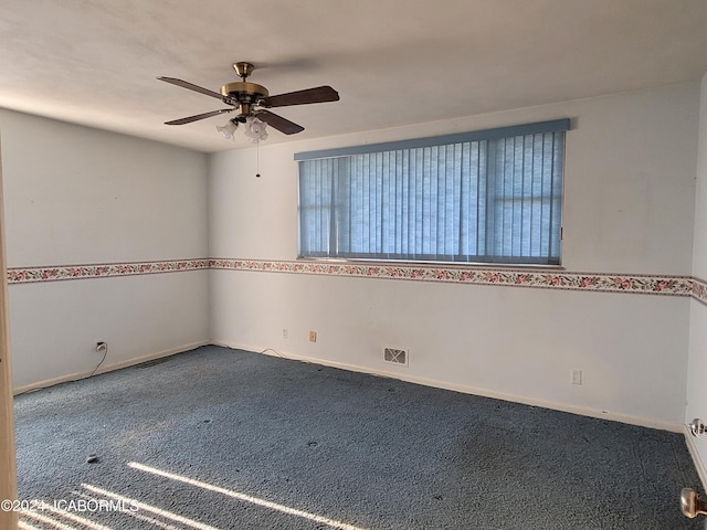 carpeted empty room with ceiling fan