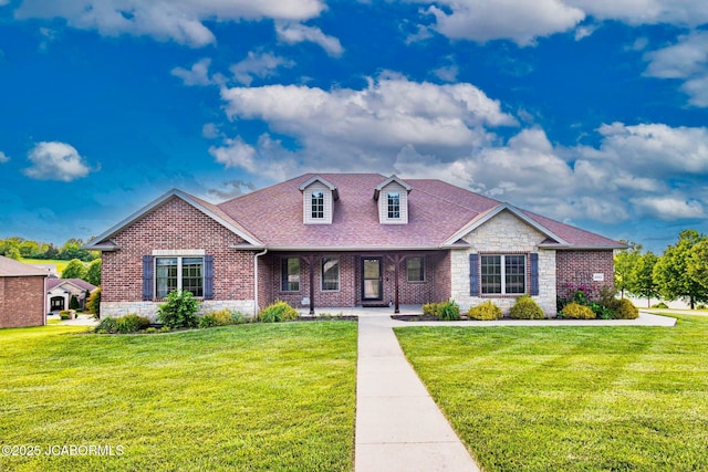 6002 Sterling Ridge Rd, Jefferson City, MO 65101 - view of front of house featuring a front yard, stone siding, roof with shingles, and brick siding