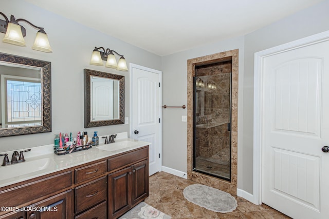 6002 Sterling Ridge Rd, Jefferson City, MO 65101 - full bathroom featuring a stall shower, double vanity, and baseboards