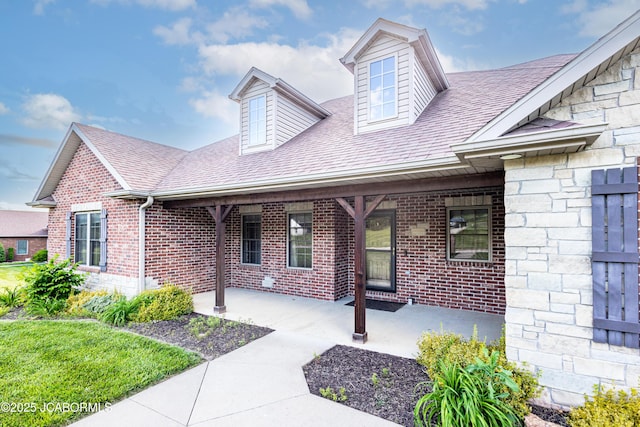 6002 Sterling Ridge Rd, Jefferson City, MO 65101 - view of front of house featuring a shingled roof and brick siding