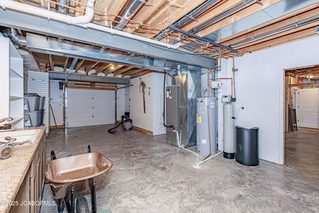 6002 Sterling Ridge Rd, Jefferson City, MO 65101 - below grade area featuring electric water heater, heating unit, a garage, and a water softener