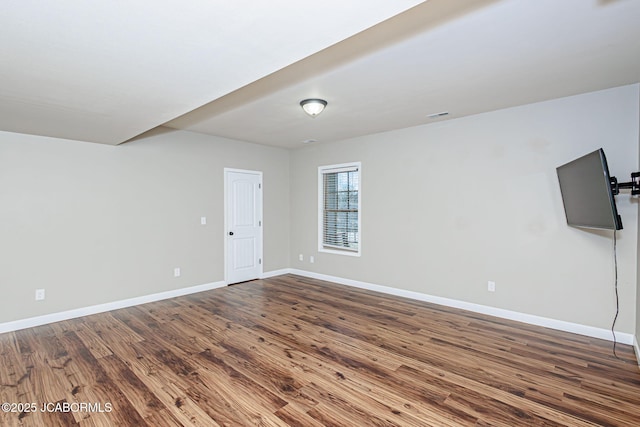 6002 Sterling Ridge Rd, Jefferson City, MO 65101 - unfurnished room featuring baseboards and dark wood-style flooring