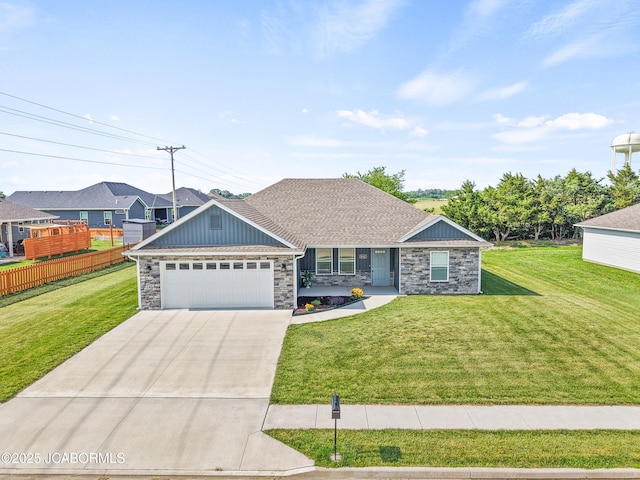 5111 Democracy Dr, Ashland, MO 65010 - view of front of property with stone siding, concrete driveway, a garage, and board and batten siding