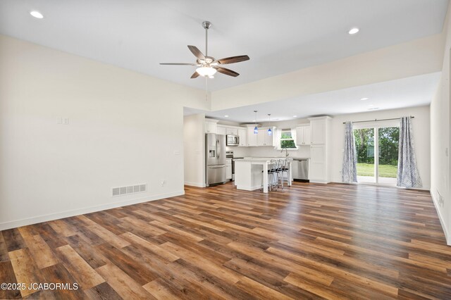 5111 Democracy Dr, Ashland, MO 65010 - unfurnished living room with a ceiling fan, dark wood-style flooring, and recessed lighting