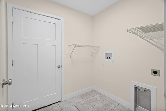 5111 Democracy Dr, Ashland, MO 65010 - laundry room with washer hookup, electric dryer hookup, and light tile patterned floors