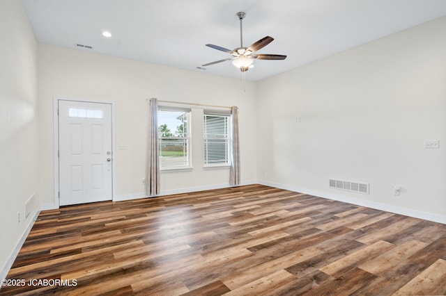 5111 Democracy Dr, Ashland, MO 65010 - empty room featuring wood finished floors, ceiling fan, and recessed lighting