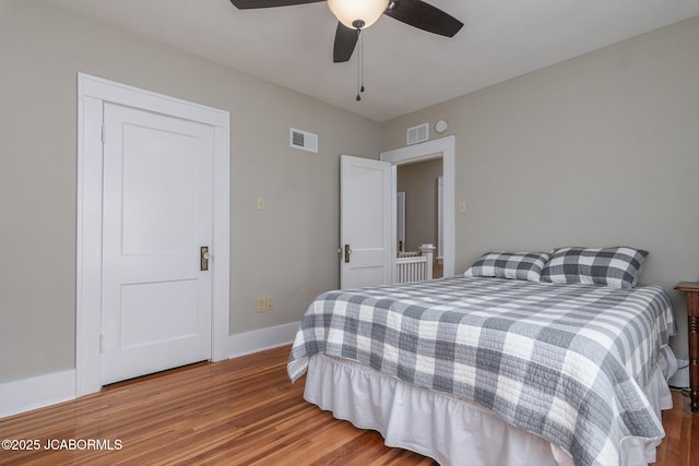 1311 Elmerine Ave, Jefferson City, MO 65101 - bedroom featuring wood finished floors and ceiling fan