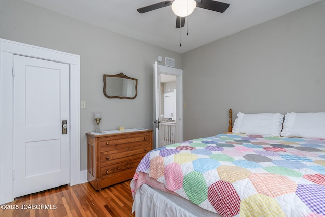 1311 Elmerine Ave, Jefferson City, MO 65101 - bedroom featuring wood finished floors and a ceiling fan