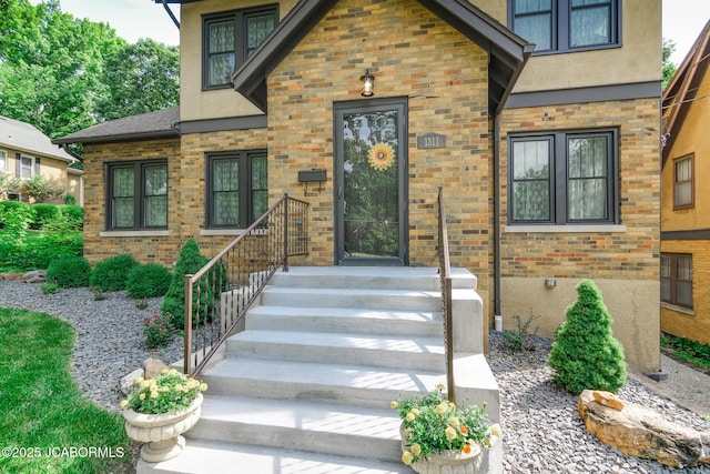 1311 Elmerine Ave, Jefferson City, MO 65101 - doorway to property with brick siding and stucco siding
