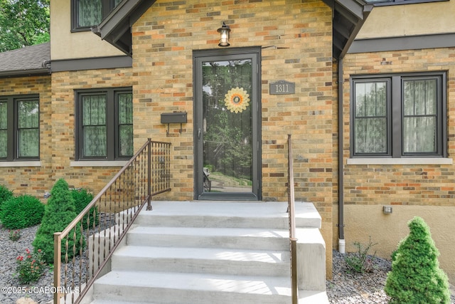 1311 Elmerine Ave, Jefferson City, MO 65101 - view of exterior entry featuring brick siding