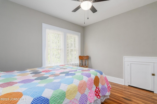 1311 Elmerine Ave, Jefferson City, MO 65101 - bedroom featuring wood finished floors and a ceiling fan